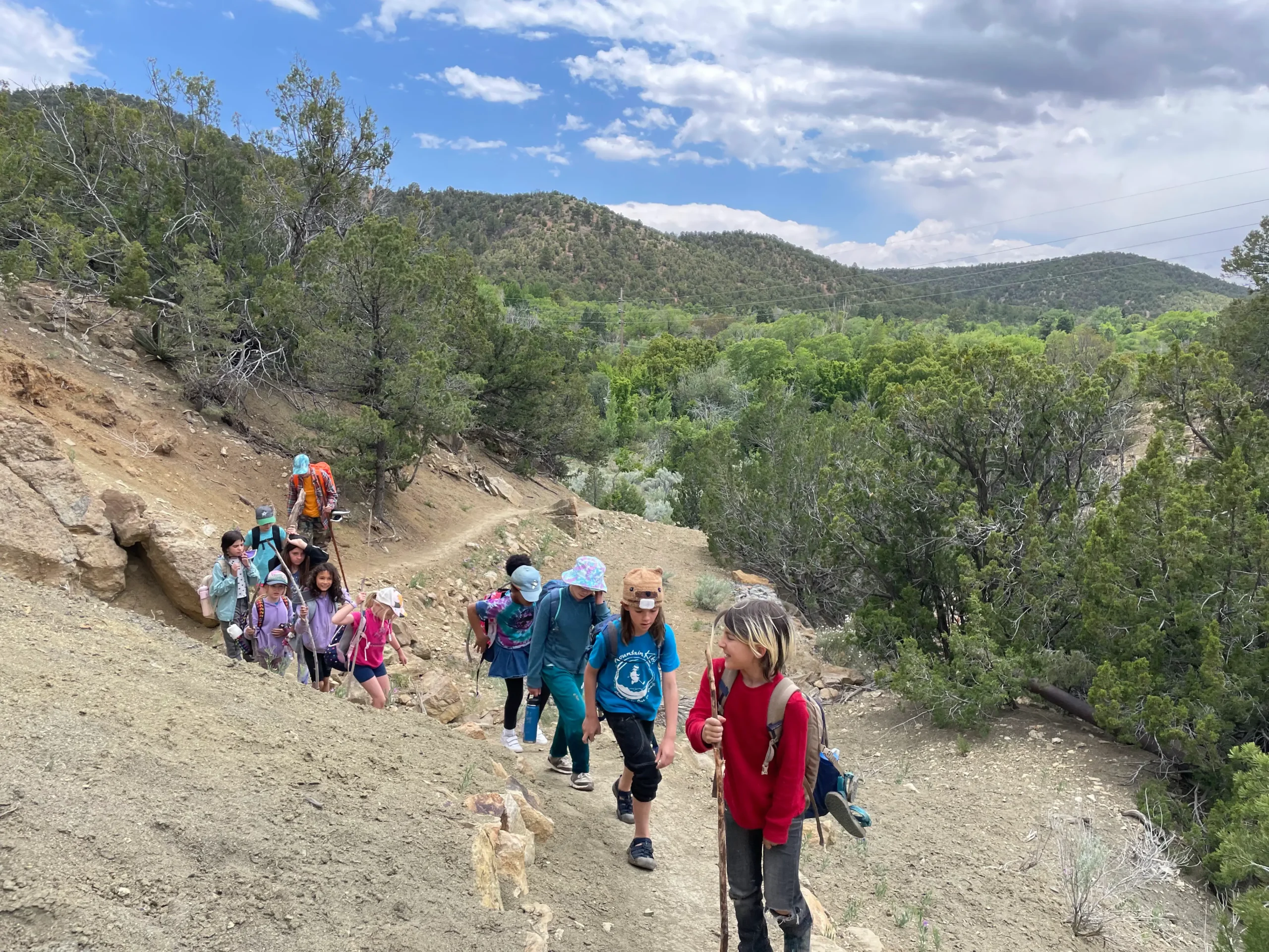 Kids hiking at Fossil Hill in the Santa Fe Canyon Preserve.