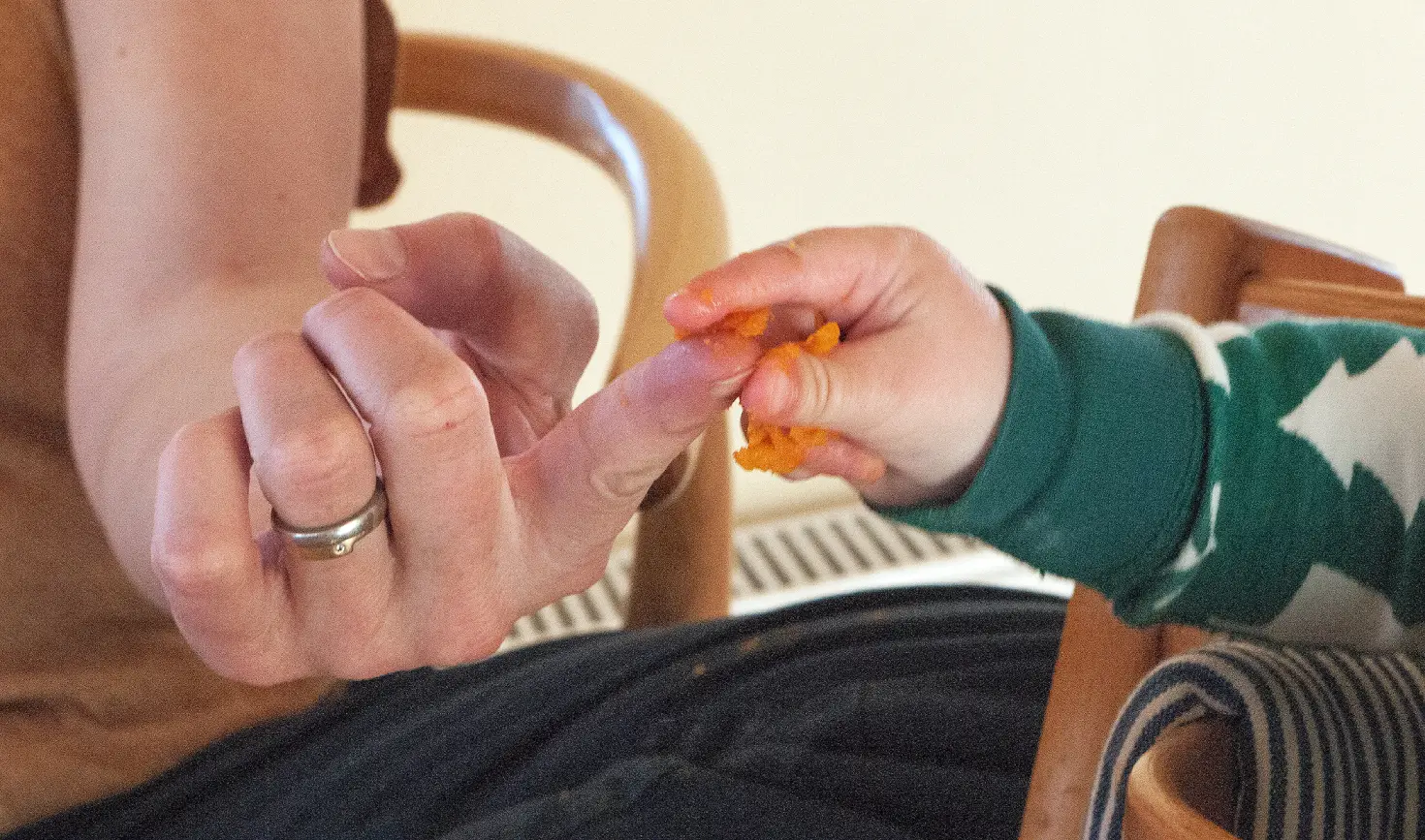 Sharing winter squash with baby.