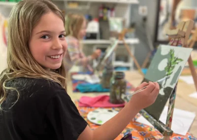 student working on artwork