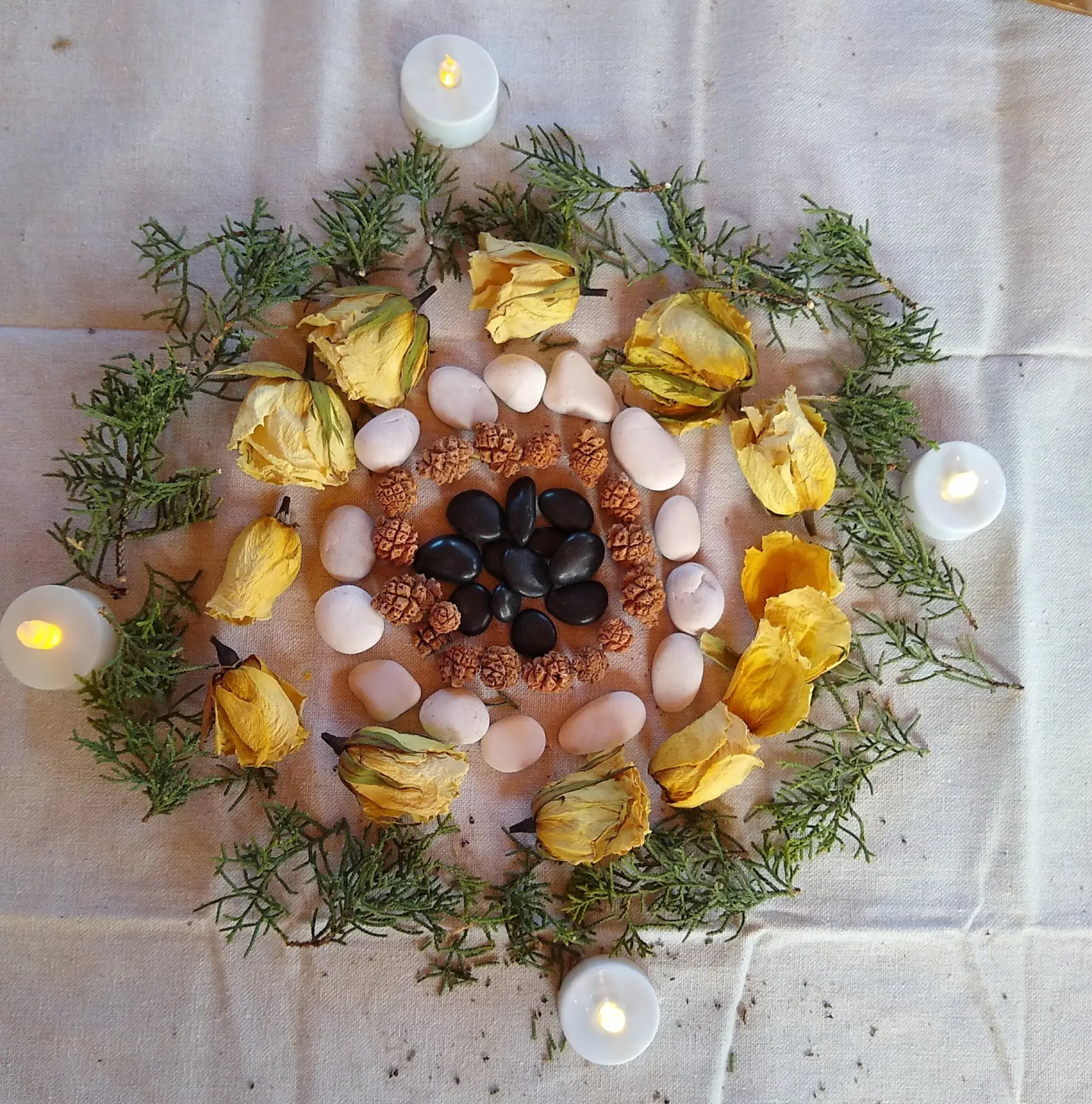 Courtesy photo: Make art with loose parts and tea light candles.